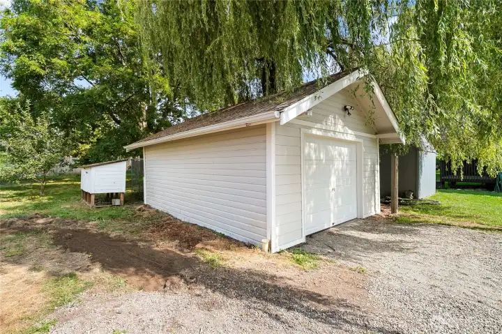 Detached 2 car garage with brand new door and fresh paint