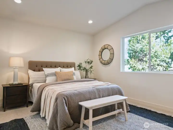 Spacious Primary Bedroom has upgraded carpet and pad.