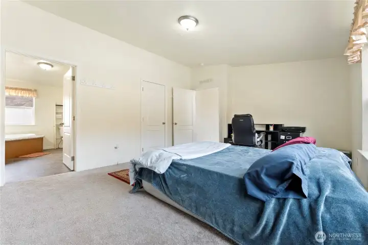 Primary bedroom with ensuite bath.