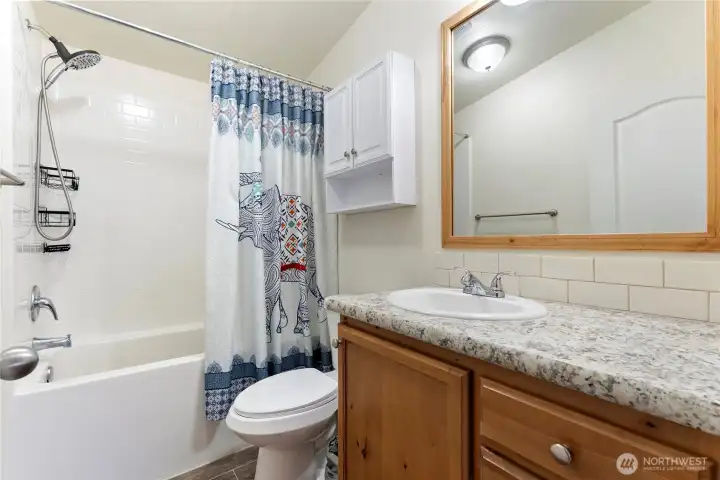 Main bathroom, located near the three guest bedrooms.