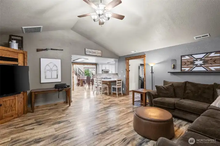 Vaulted ceilings, utility room off of family room with lots of storage!