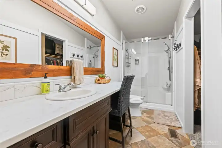 Large updated primary bath with large walk in closet.
