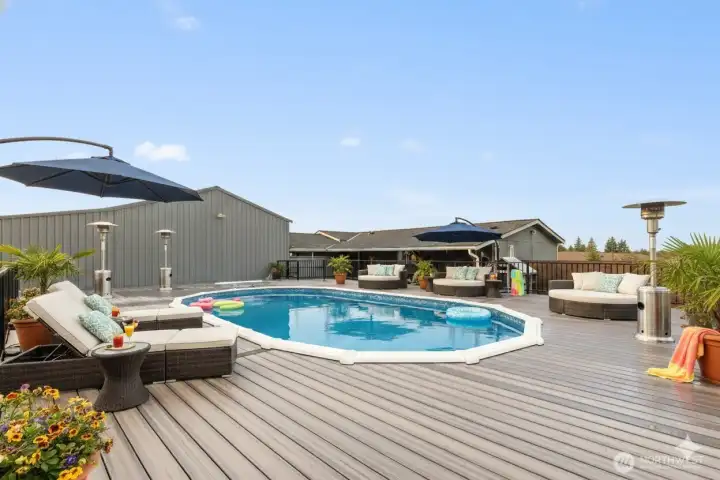 Look at this amazing pool!!! Ready for your enjoyment!! *has been virtually staged