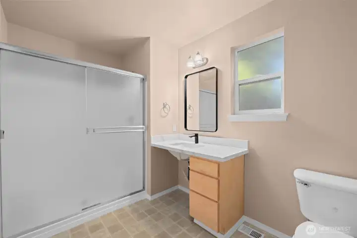 Ensuite bathroom that is wheelchair accesible, suitable for multi-generational living.