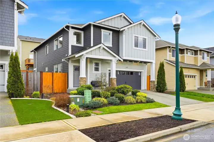 Beautiful modern home for sale in Covington, Washington featuring clean contemporary architecture, manicured landscaping, and inviting curb appeal in a desirable neighborhood with parks, trails, and community amenities.