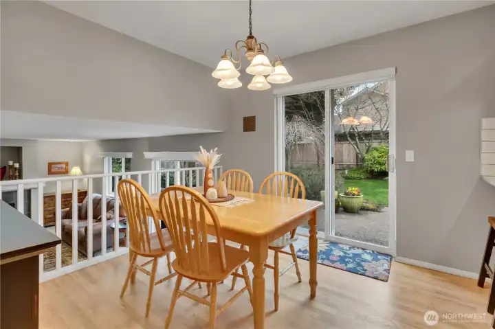 Kitchen features an eating area that leads to the outdoor living and entertainment space.