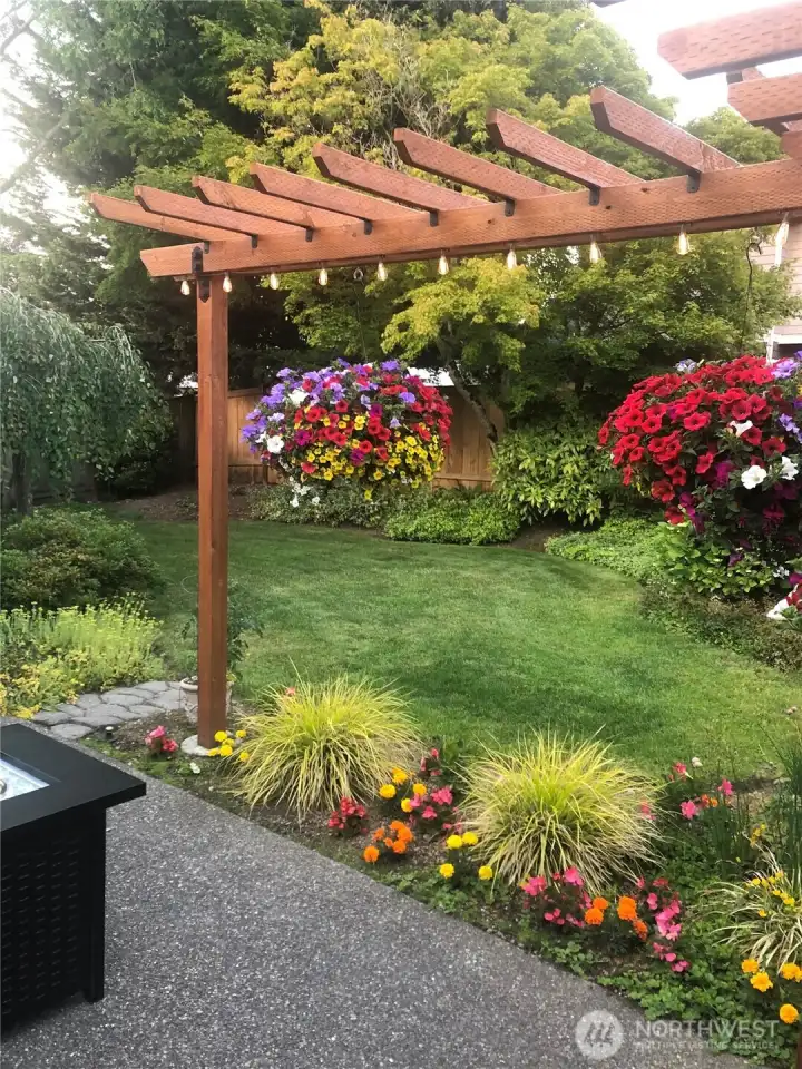 Customer provided photo showcasing this amazing backyard and entertaining area.