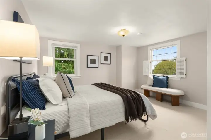 Views of the sound and trees with built in, cedar lined closets.