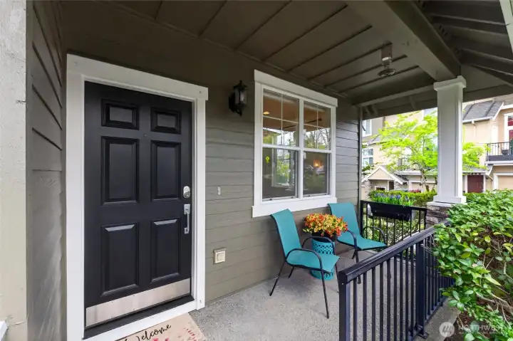 A covered front patio creates a comfortable outdoor extension of the home, ideal for morning coffee or evening relaxation. With an additional private rear patio, this home offers multiple outdoor living options that are hard to find in townhome living