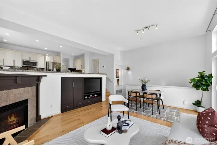 Defined dining area positioned just off the kitchen creates an easy, everyday gathering space with room for both casual meals and hosting. Elevated sightlines to the kitchen keep the space connected and easy to access.