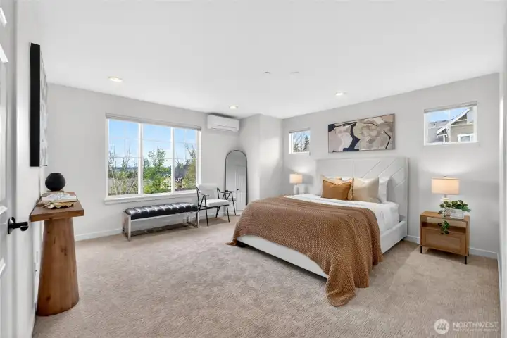 The primary suite is thoughtfully designed as a private retreat, offering generous proportions and a serene, light-filled ambiance. Its elevated position invites soft natural light throughout the day, while views toward the foothills create a quiet connection to the surrounding Highlands landscape.