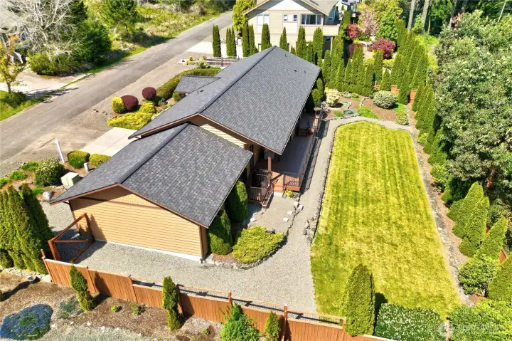 The home has a great fully fenced yard and lovely landscaping