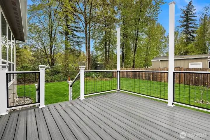 Deck flows to fully fenced yard