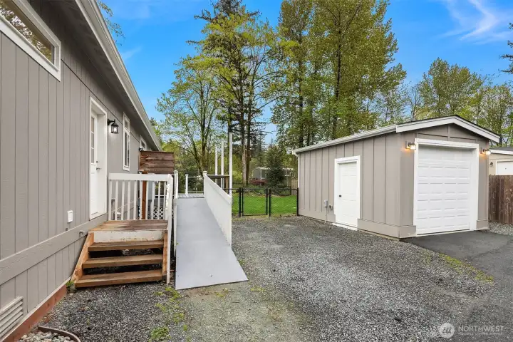 Accessible ramp, stairs, parking spot