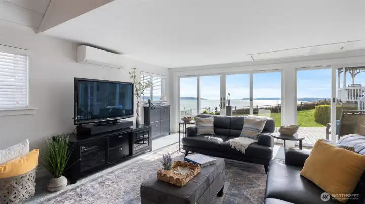 A full wall of windows/ sliding doors maxmizes the view!