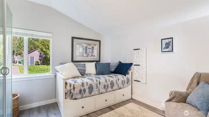 Bedroom #2 has a vaulted ceiling for a light and airy feel