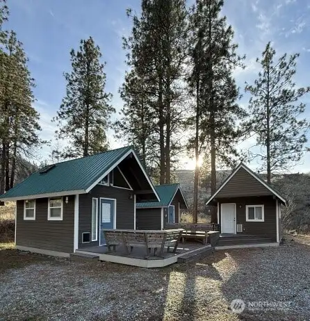 Three structures for cooking, sleeping and bathing.