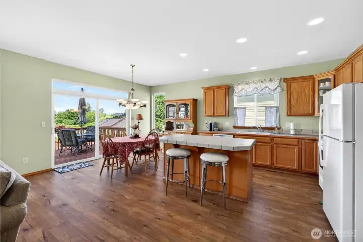 The island provides extra seating and prep space.