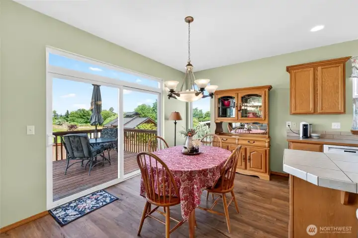 This space has amazing flow with a door leading out to the deck.