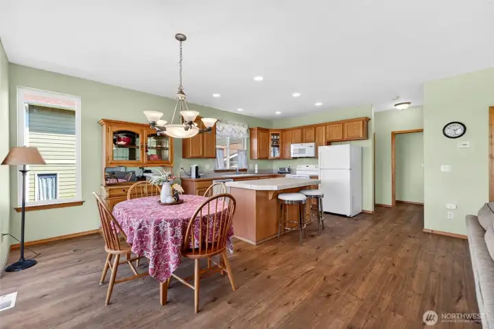 Down that hallway is the powder room, laundry room, and garage access.