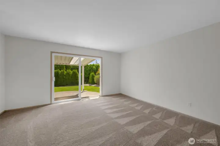 Large Primary bedroom with sliders for patio.