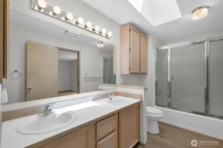 Double sinks and huge vanity, Tons of storage and soaking tub.