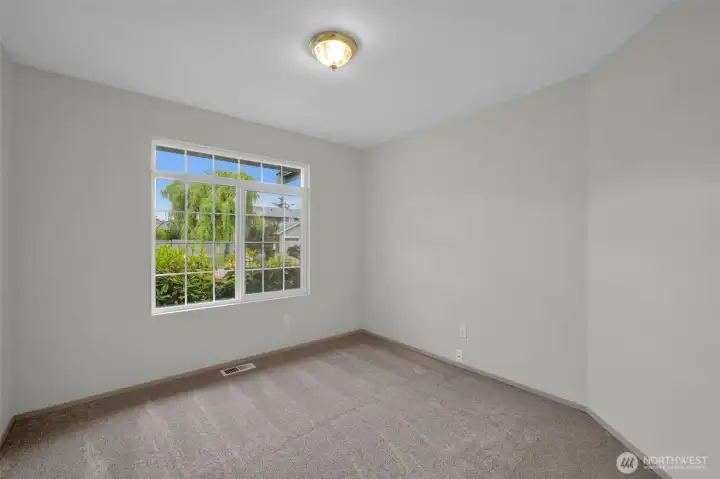 1st Spacious bedroom with full length closet.