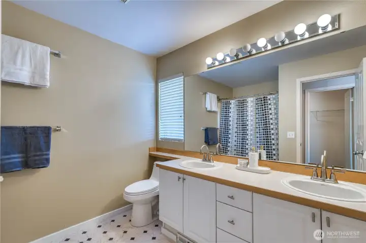 rimary ensuite with double sinks and combination bath tub and shower. rimary ensuite with double sinks and combination bath tub and shower.