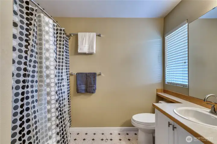 Primary ensuite with bath tub and shower. Primary ensuite with bath tub and shower.