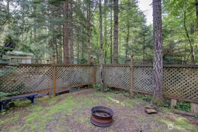 Privacy with fence and mature trees surrounding