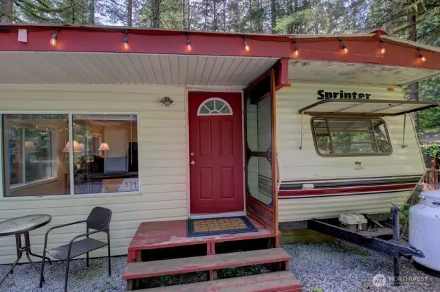 Welcoming entrance with covered porch