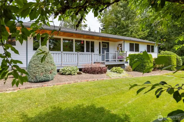 Mature Landscaping and covered front porch.