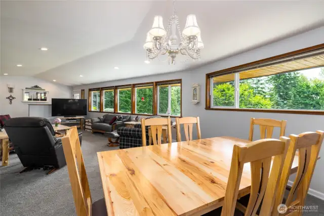 Spacious Open Living with newer carpet and so much natural light flowing through the new double pane windows that block harmful rays and heat.