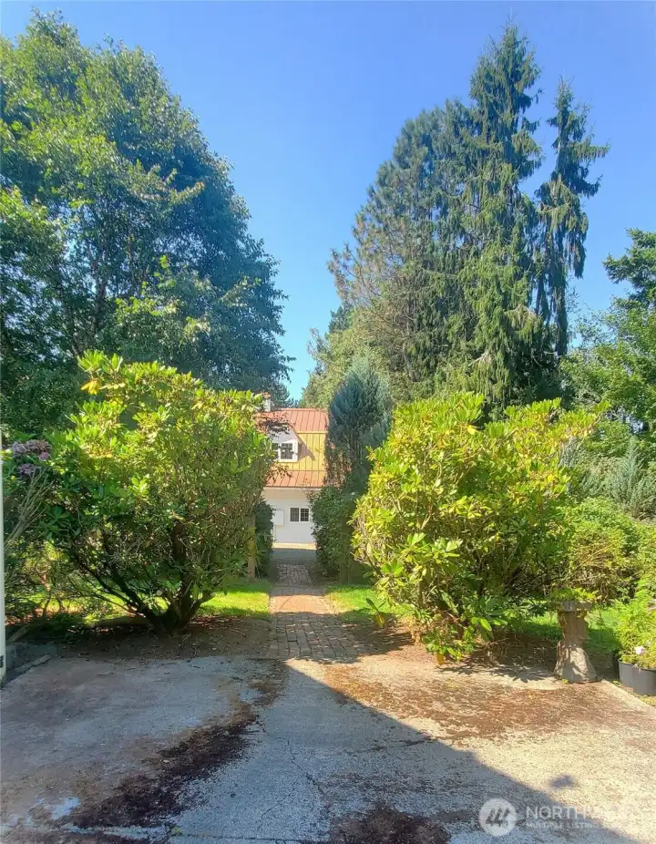 path from house patio to The Copper Loft