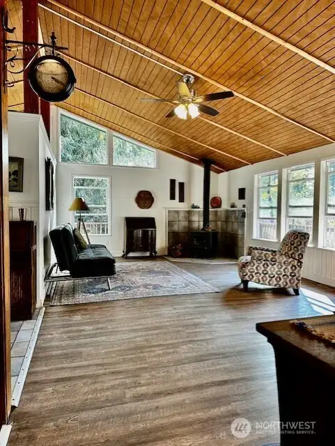 Bright with huge double pane windows, vaulted ceilings & skylights!