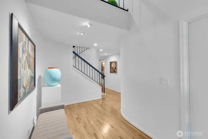 Enter to the vestibule with gleaming hardwoods.