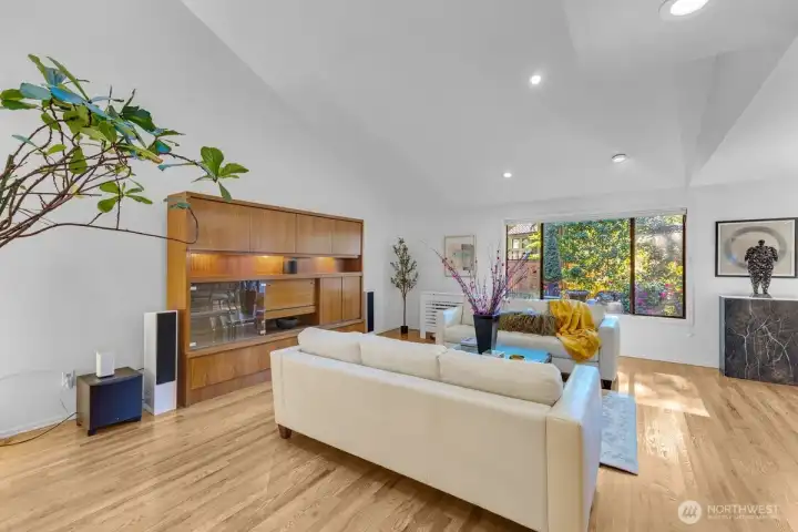 High ceilings, loads on natural light, bright and expansive living room.