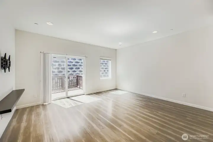 main level living area with deck