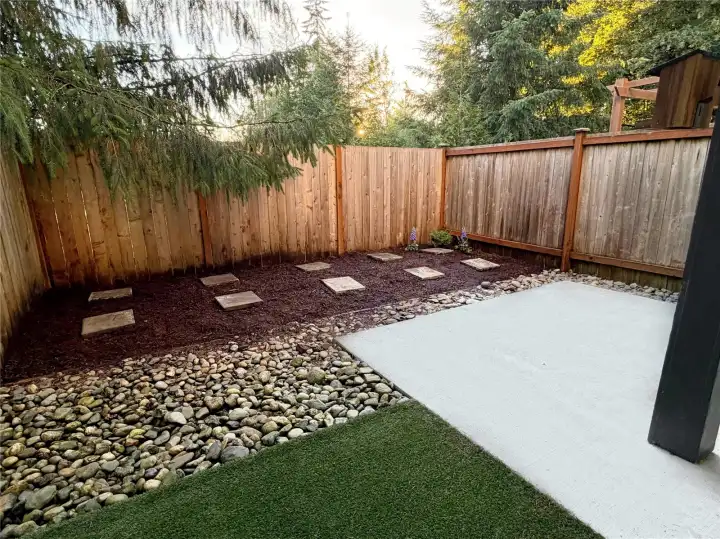 Low maintenance yard is fully fenced and includes a turf area, garden space and patio. Low maintenance yard is fully fenced and includes a turf area, garden space and patio.
