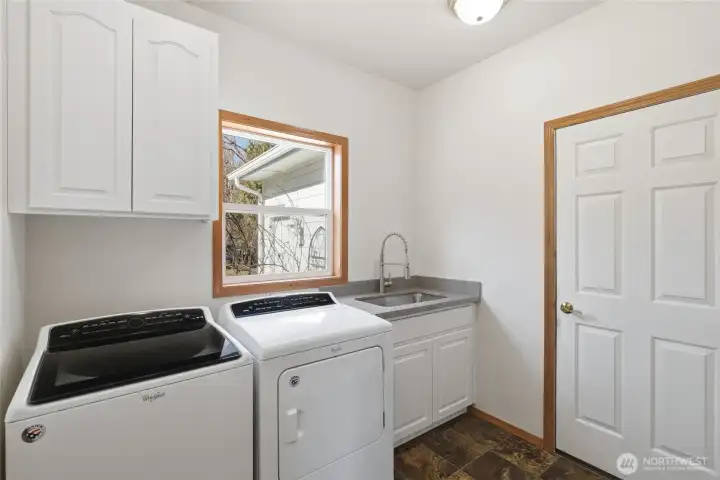 Main floor Utility & Mud room off the three car garage