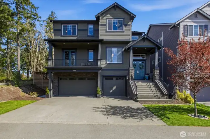 Impressive multi-level home located on a quiet dead-end street adjacent to forested greenbelt with trail access.