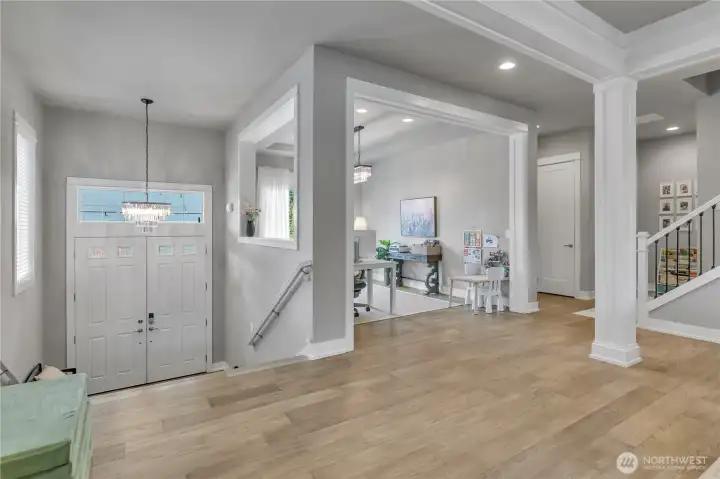 Engineered hardwood flooring throughout with no carpet.