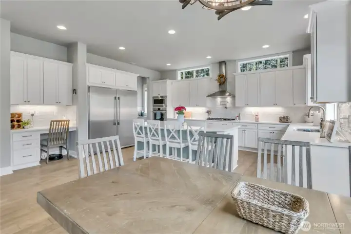 The dining area is open to the kitchen for easy flow gatherings