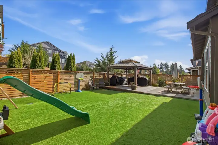 ~ $40,000 in post-purchase upgrades, primarily in professional landscaping; high-quality artificial turf for low-maintenance living and pergola outbuilding.