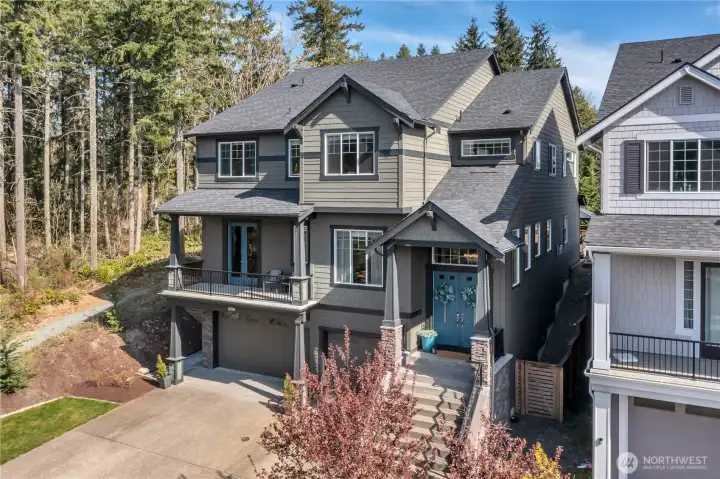 Nestled in a forested Pacific Northwest setting with abundant nature.