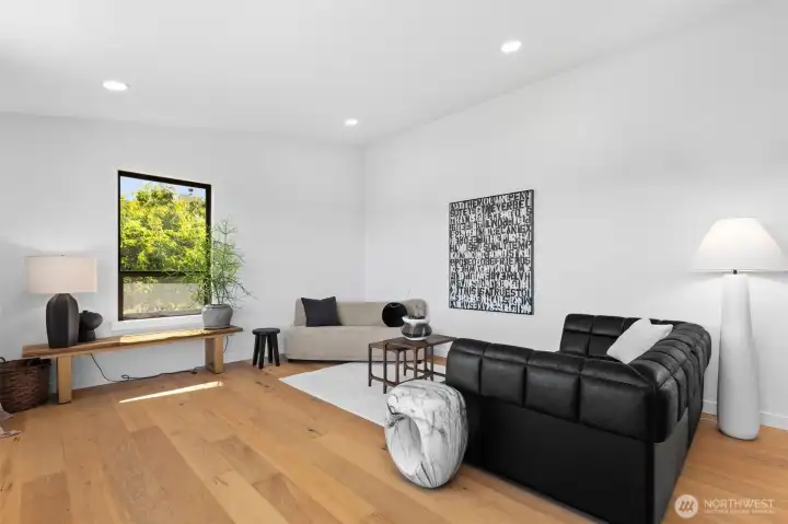 Vaulted ceilings and lots of light in this expansive living room. Vaulted ceilings and lots of light in this expansive living room.