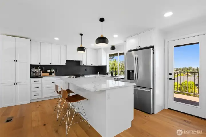 Large kitchen with views of the Sound. Large kitchen with views of the Sound.