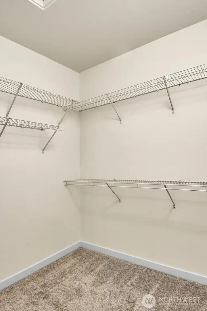 Primary suite walk in closet.