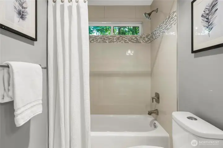 Upstairs full bath. Upstairs full bath.