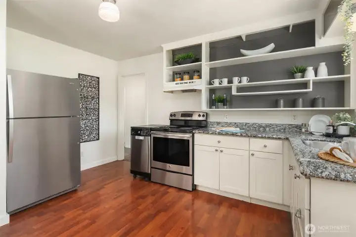 Kitchen with ample cabinet storage.